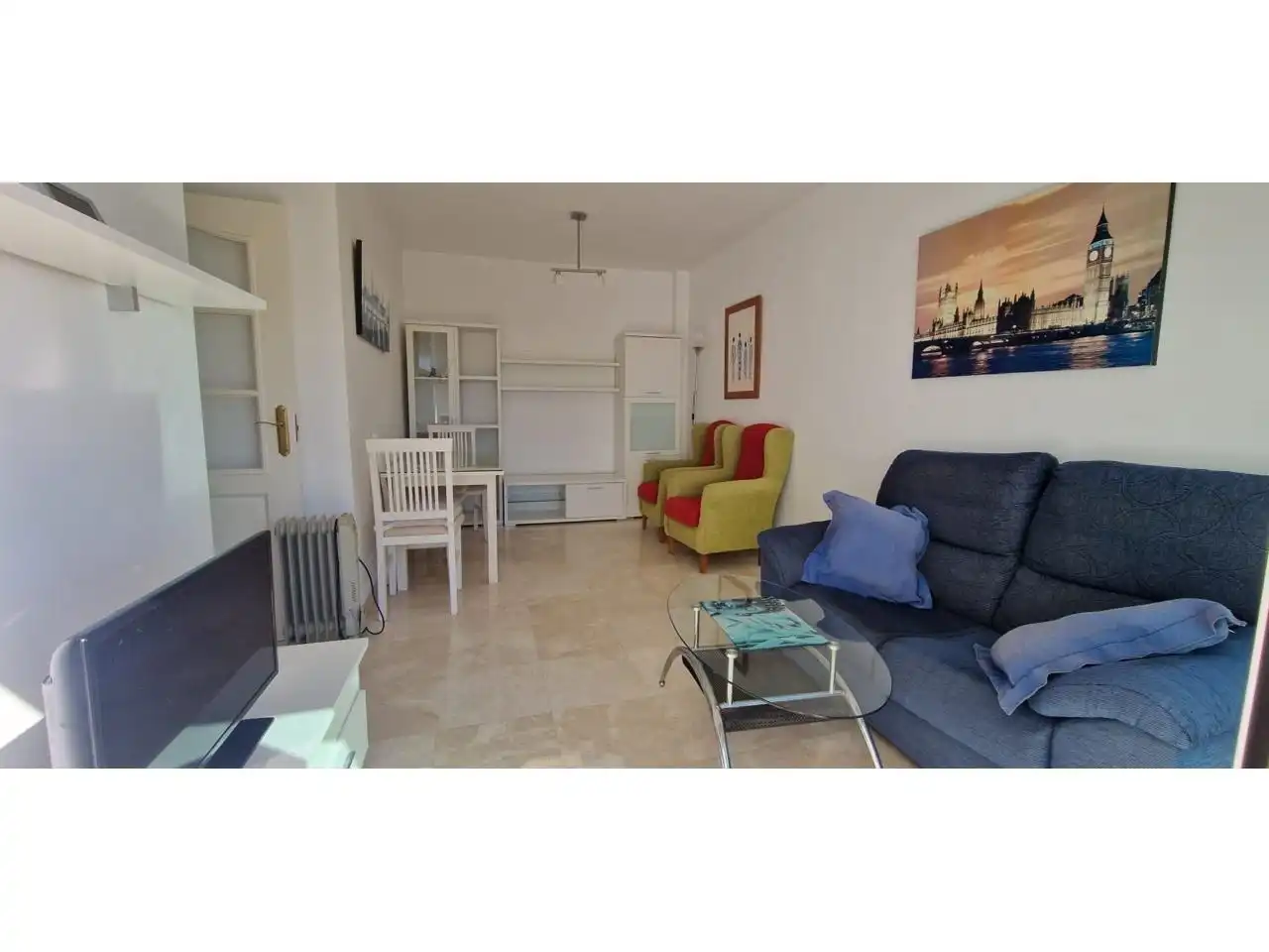 Sala d'estar de Apartament en venda en Benalmádena amb Aire condicionat, Jardí privat i Terrassa