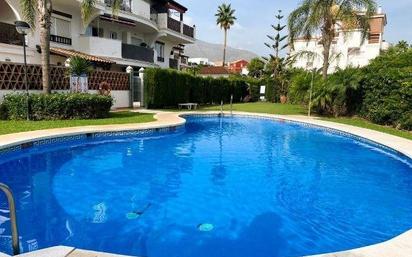 Swimming pool of Planta baja for sale in Mijas  with Air Conditioner, Heating and Private garden