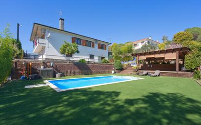 Swimming pool of House or chalet for sale in Bigues i Riells  with Air Conditioner, Heating and Private garden