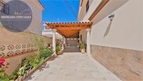 Exterior view of Single-family semi-detached for sale in Águilas  with Air Conditioner, Heating and Private garden