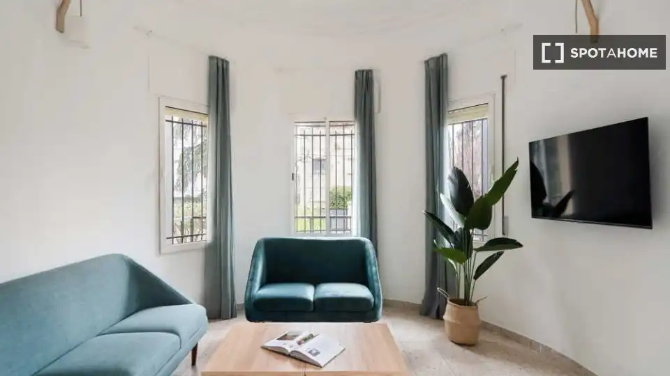 Sala de estar de Piso para compartir en Madrid con Aire acondicionado, Terraza y Amueblado