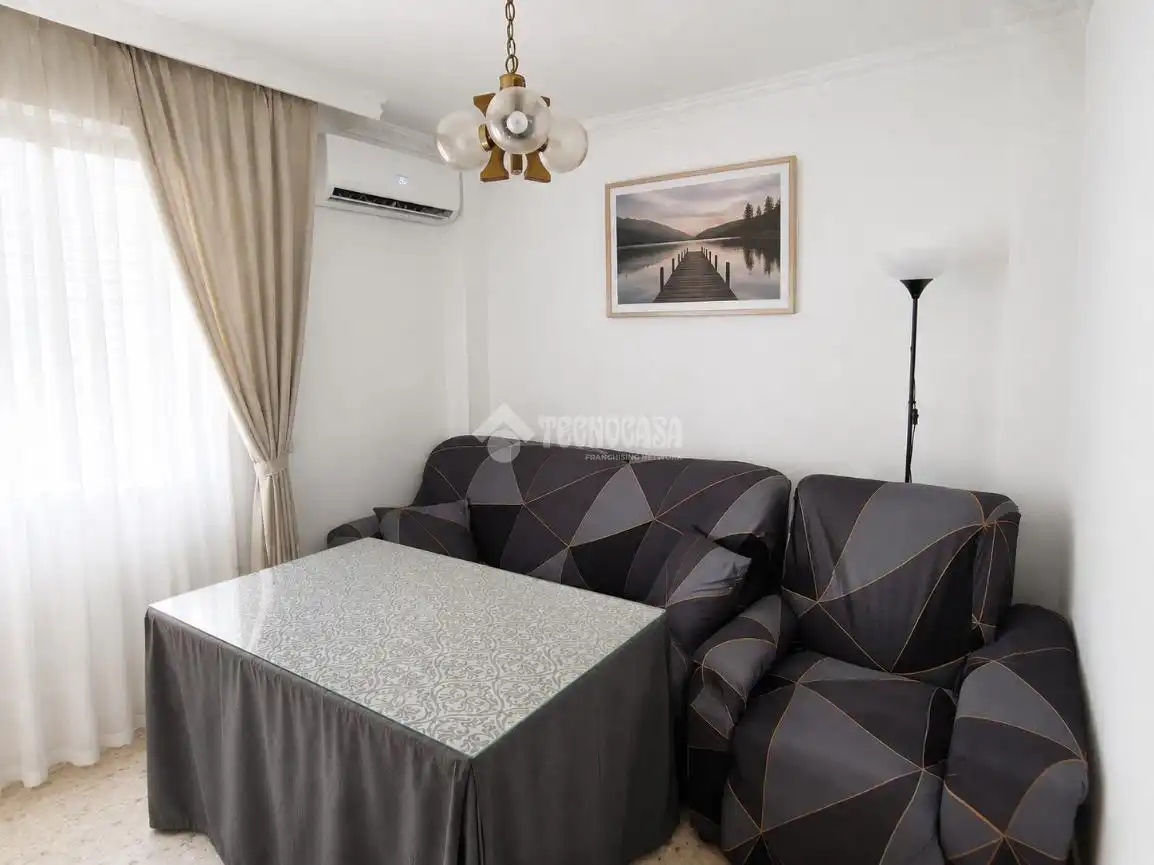 Sala de estar de Casa adosada en venta en Sevilla con Aire acondicionado, Terraza y Balcón