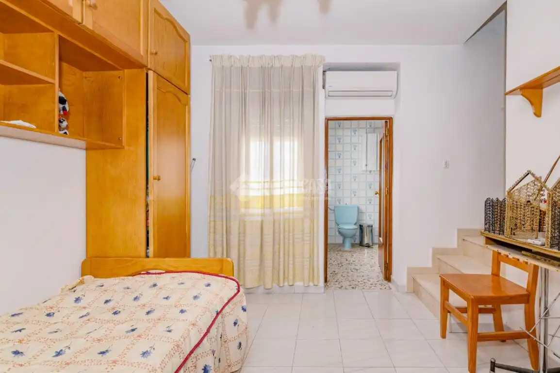 Habitación de Casa adosada en venta en Lucena con Aire acondicionado y Amueblado