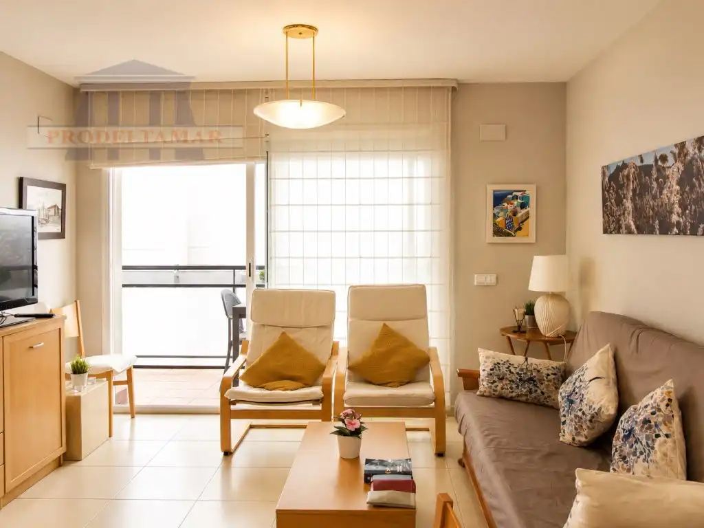 Sala de estar de Apartamento en venta en L'Ampolla con Aire acondicionado, Amueblado y Horno