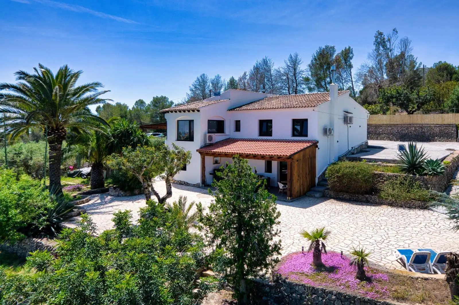 Vista exterior de Casa o xalet en venda en Benissa amb Aire condicionat, Jardí privat i Piscina