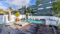 Swimming pool of Single-family semi-detached for sale in  Madrid Capital  with Swimming Pool
