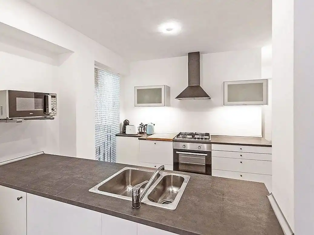 Cocina de Apartamento para compartir en Huelva con Aire acondicionado y Amueblado