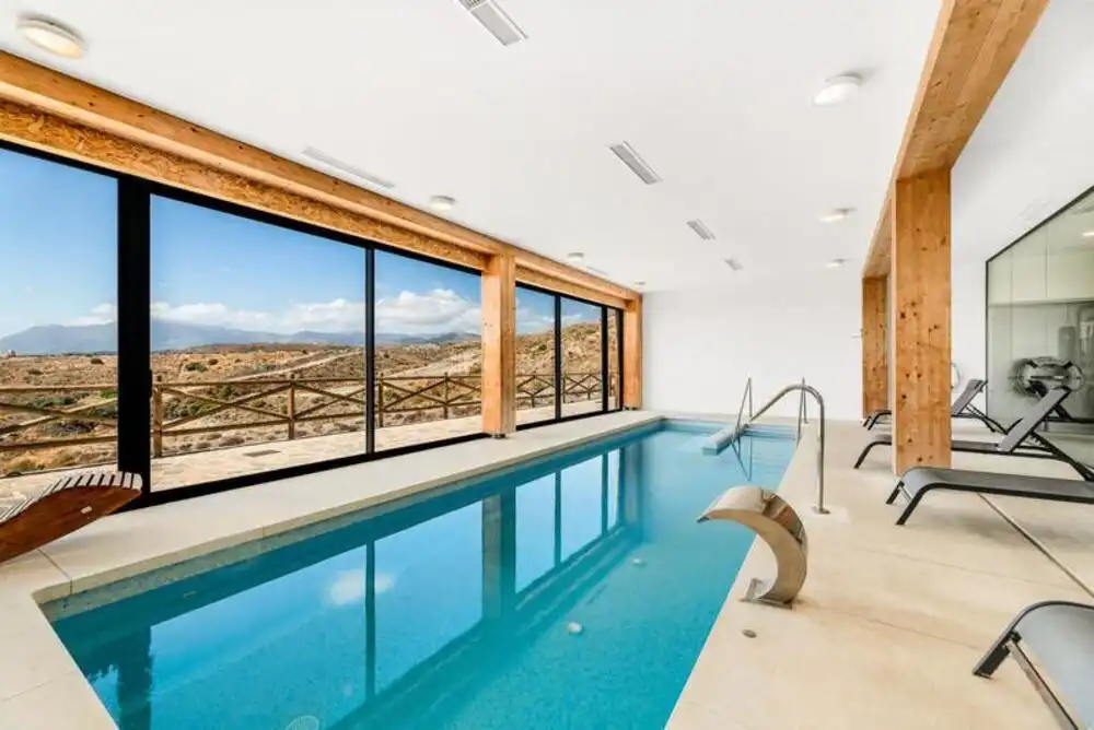 Piscina de Planta baja en venta en Benahavís con Aire acondicionado, Jardín privado y Terraza