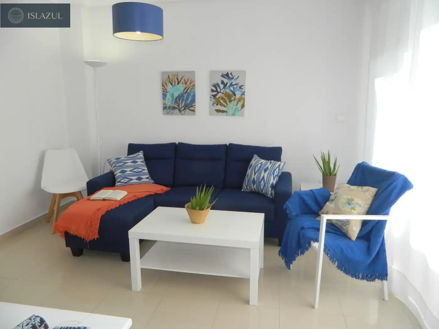 Sala de estar de Dúplex de alquiler en Isla Cristina con Terraza, Balcón y Piscina comunitaria