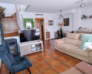 Sala d'estar de Casa adosada en venda en Castellón de la Plana / Castelló de la Plana amb Aire condicionat, Calefacció i Jardí privat