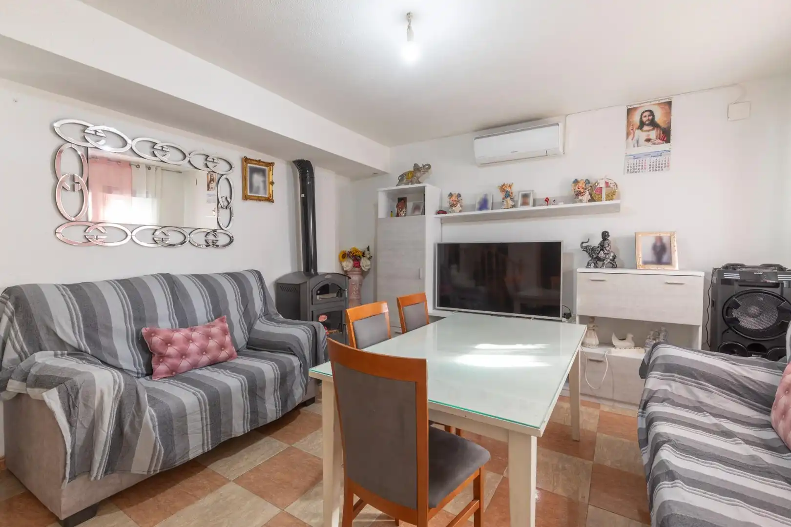 Sala de estar de Casa adosada en venta en Guadix con Aire acondicionado y Terraza