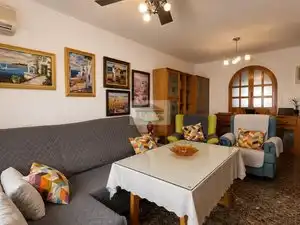 Sala de estar de Casa adosada en venta en Vegas del Genil con Aire acondicionado, Calefacción y Jardín privado
