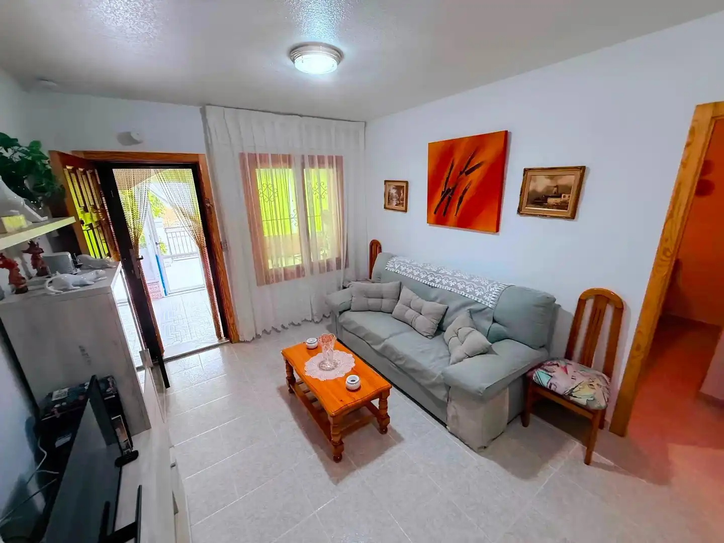 Sala de estar de Casa adosada en venta en Los Alcázares con Aire acondicionado y Alarma