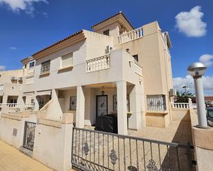 Exterior view of Single-family semi-detached for sale in Torrevieja  with Private garden, Terrace and Community pool