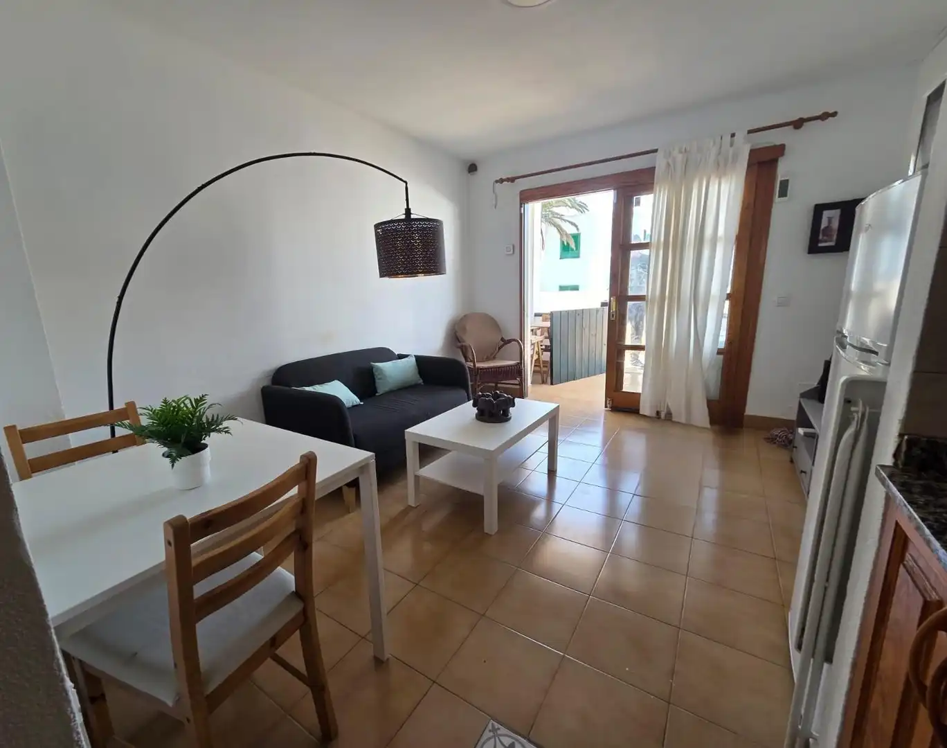 Sala de estar de Apartamento en venta en Tías con Terraza y Piscina comunitaria