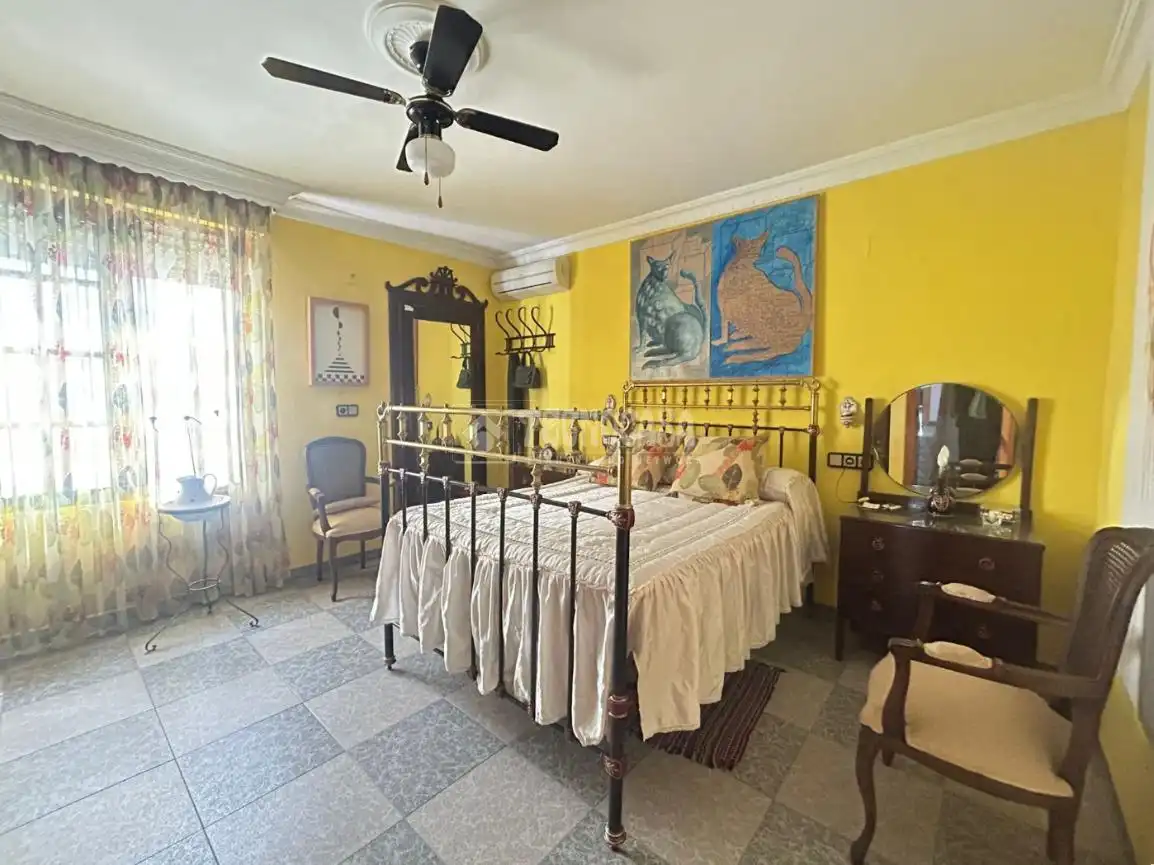Habitación de Casa adosada en venta en Huelva con Aire acondicionado