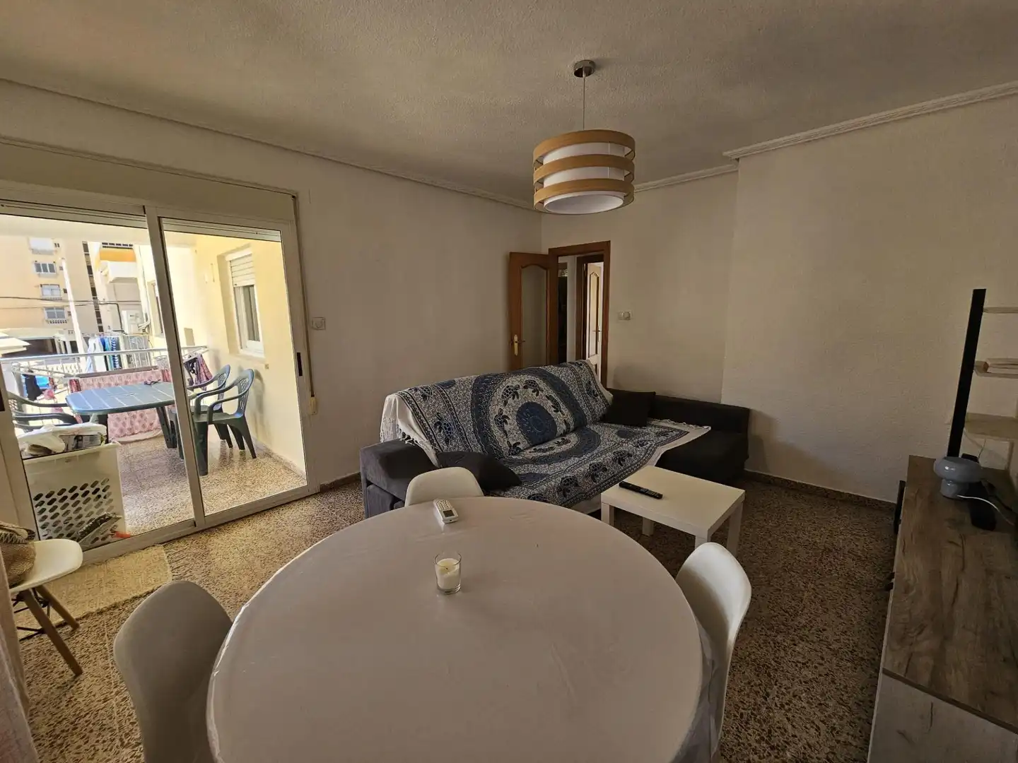 Sala de estar de Piso en venta en Tavernes de la Valldigna con Aire acondicionado, Terraza y Amueblado