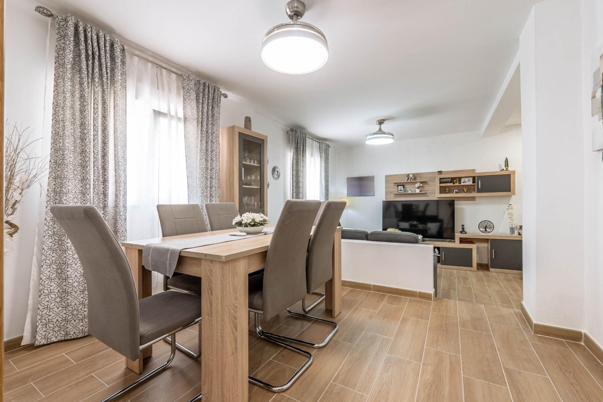 Sala d'estar de Casa adosada en venda en La Malahá amb Aire condicionat, Terrassa i Traster