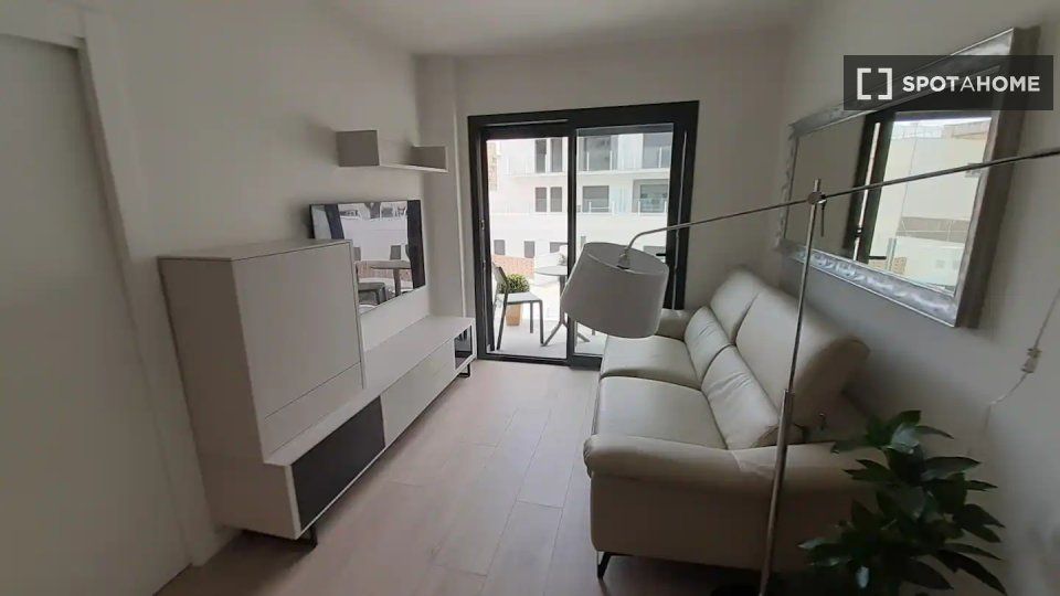 Living room of Flat to rent in Vilanova i la Geltrú  with Air Conditioner, Heating and Furnished