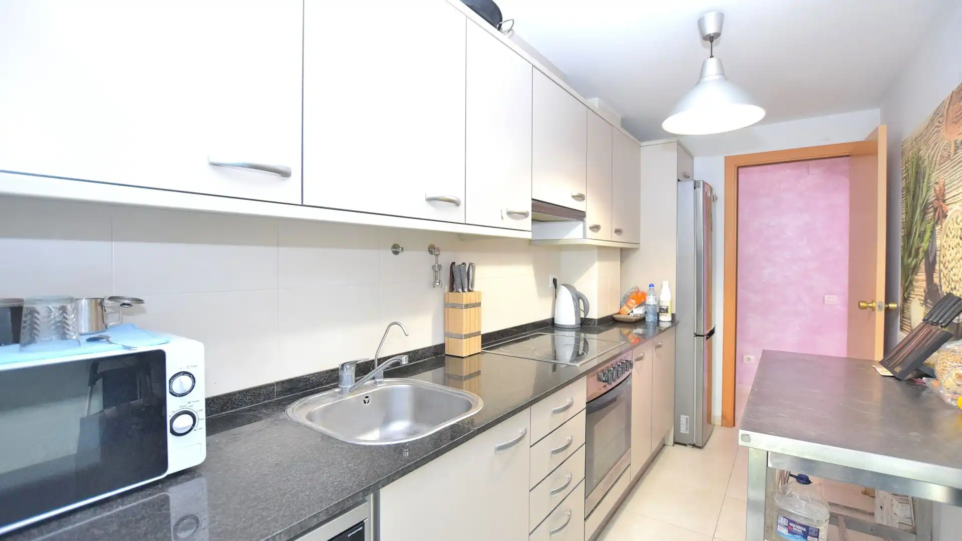 Küche von Wohnung zum Verkauf in Salou mit Klimaanlage, Heizung und Privatgarten