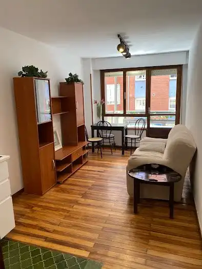Living room of Flat for rent in Gijón   with Heating, Parquet flooring and Furnished