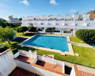 Swimming pool of Single-family semi-detached for sale in Conil de la Frontera  with Air Conditioner, Parquet flooring and Terrace