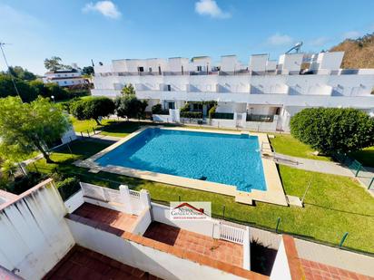 Swimming pool of Single-family semi-detached for sale in Conil de la Frontera  with Air Conditioner, Parquet flooring and Terrace