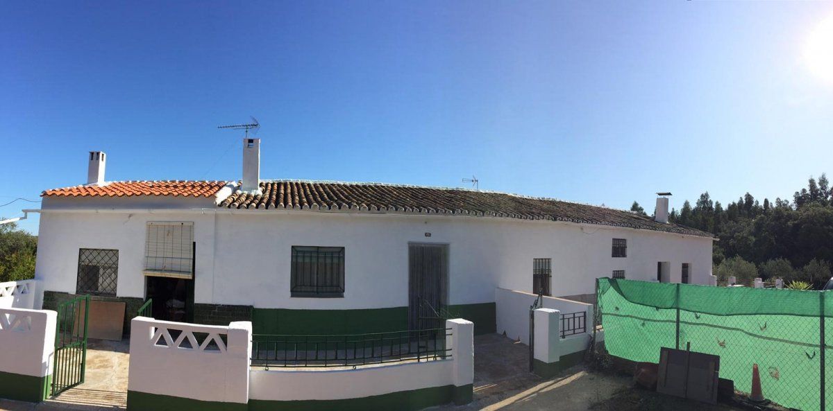 Außenansicht von Country house zum verkauf in Valverde del Camino mit Heizung