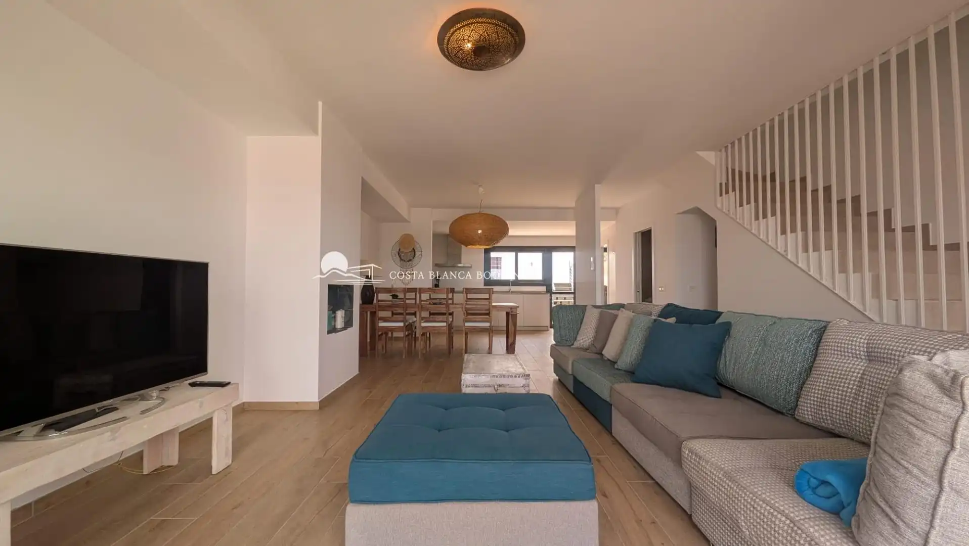 Sala d'estar de Casa adosada en venda en L'Alfàs del Pi amb Piscina comunitària
