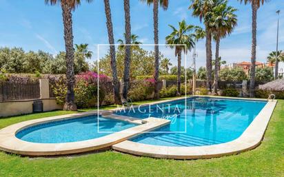 Garden of Single-family semi-detached for sale in El Campello  with Air Conditioner, Terrace and Swimming Pool