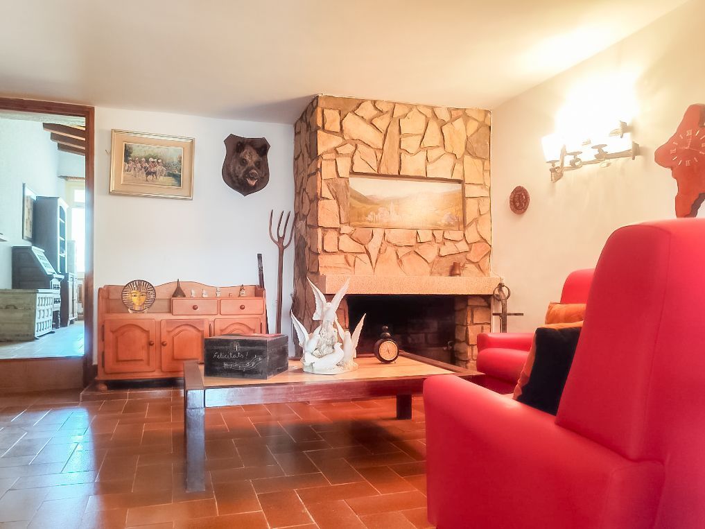 Sala d'estar de Casa o xalet en venda en Caldes de Malavella amb Aire condicionat, Calefacció i Jardí privat