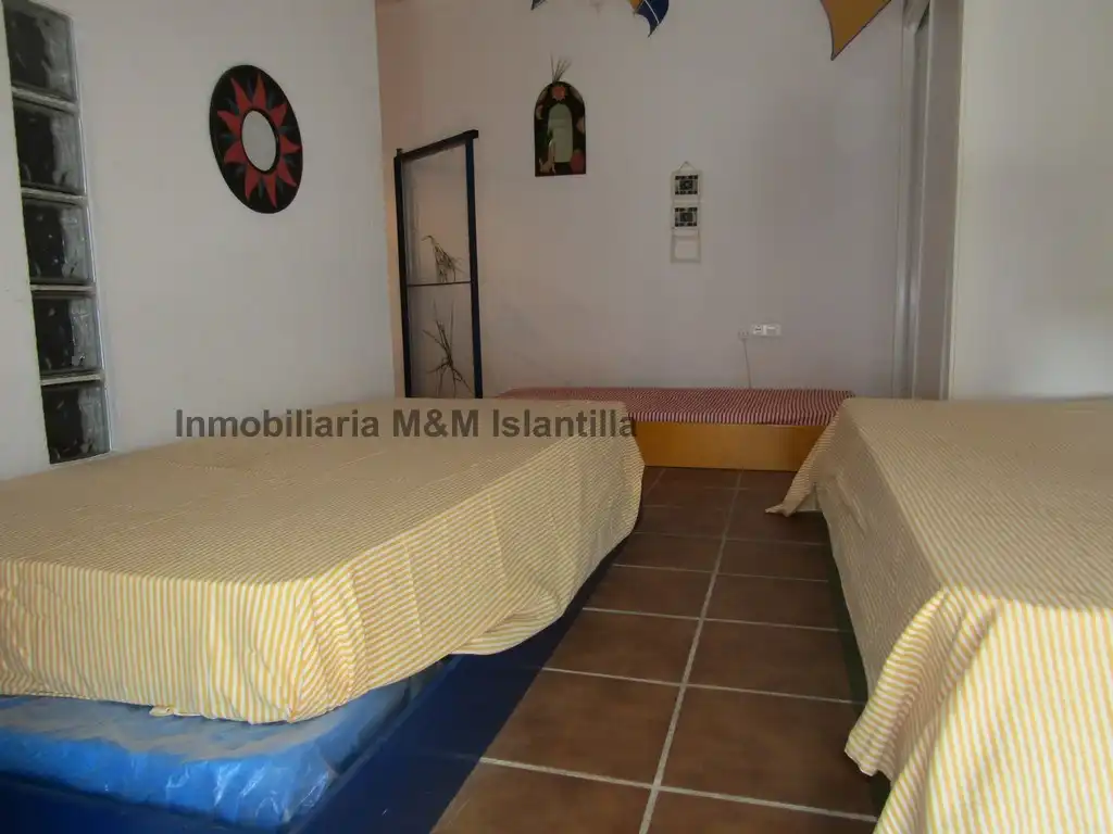 Habitación de Casa adosada en venta en Islantilla con Terraza, Trastero y Amueblado