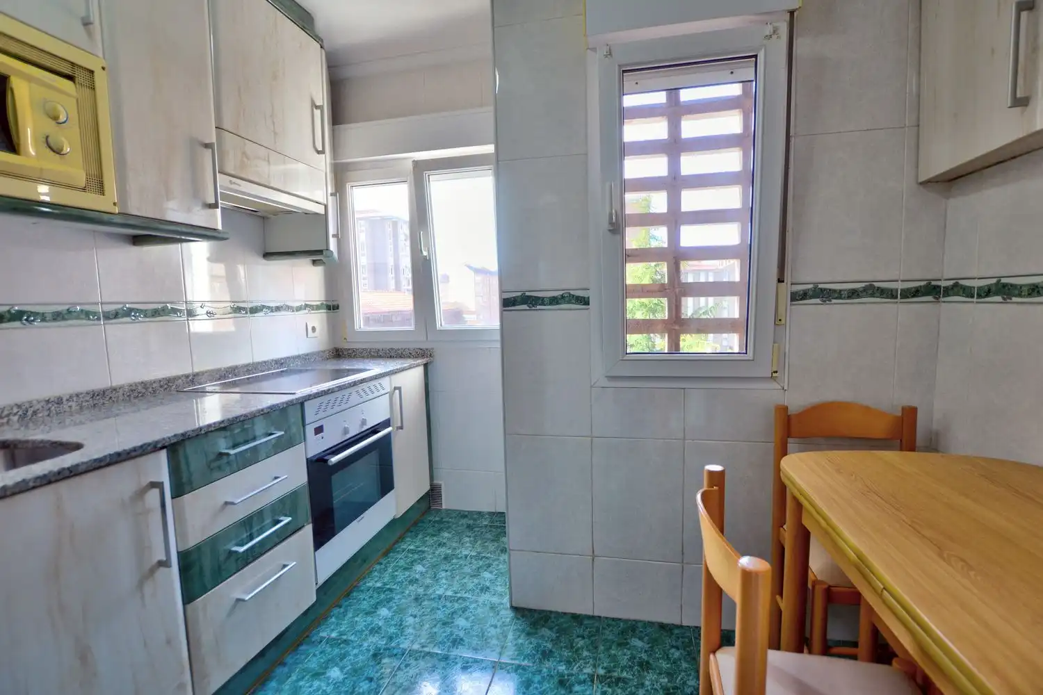 Kitchen of Flat for sale in Gijón   with Storage room and Swimming Pool