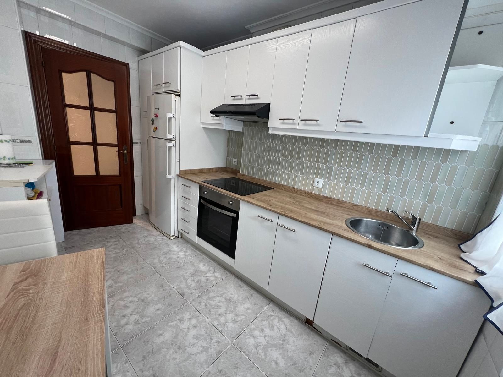 Kitchen of Flat to rent in Gijón   with Heating, Furnished and Oven