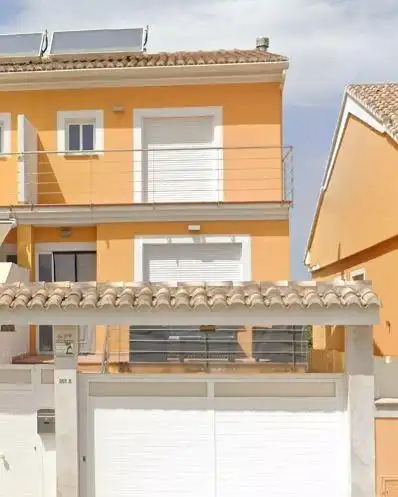 Vista exterior de Casa adosada en venda en Gandia amb Jardí privat, Terrassa i Piscina
