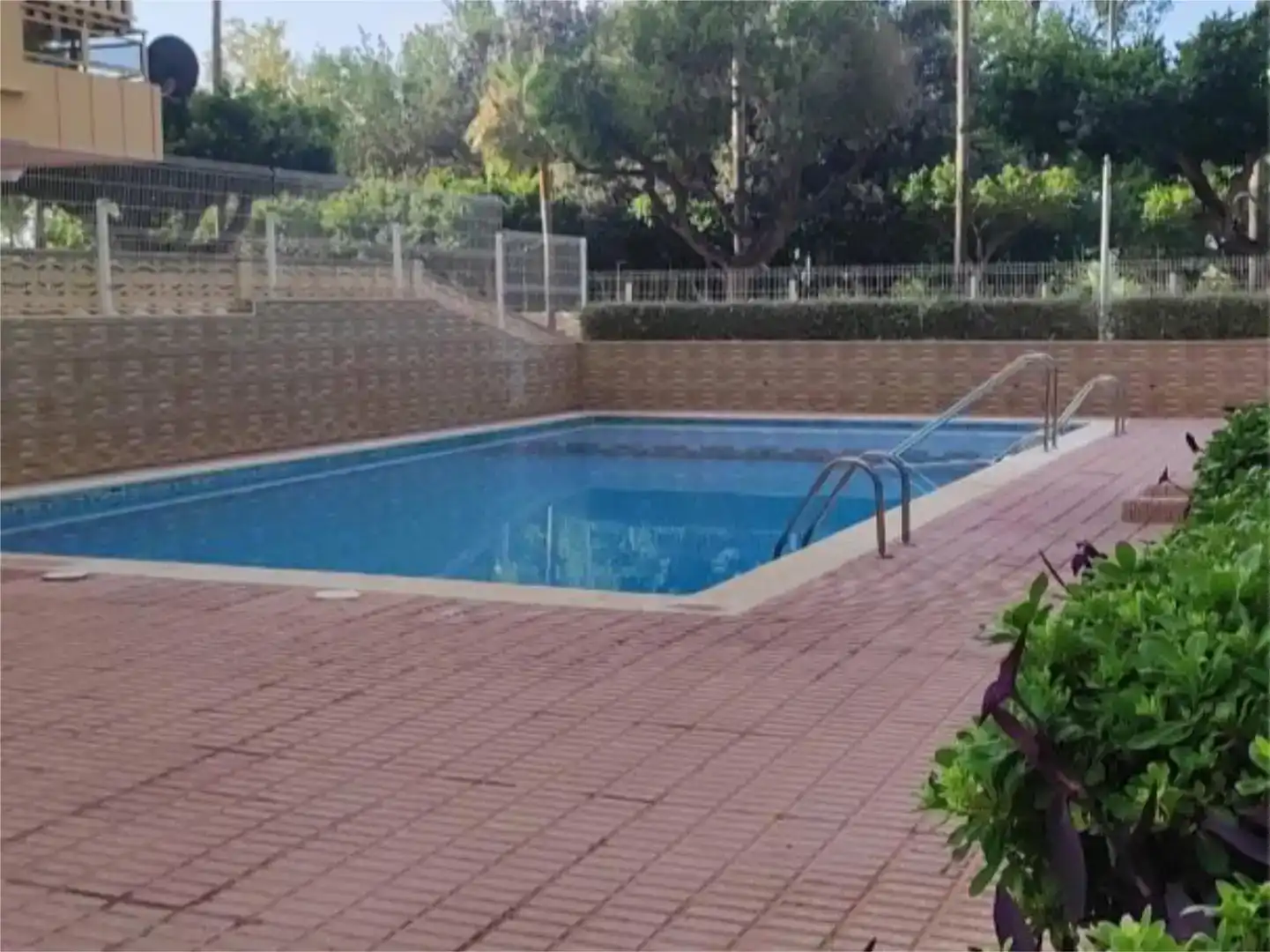 Schwimmbecken von Wohnung zur Miete in Cullera mit Schwimmbad und Balkon