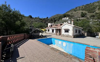 Vista exterior de Casa o xalet en venda en Cómpeta amb Terrassa i Piscina