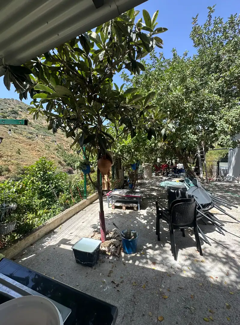 Vista exterior de Finca rústica en venda en Benamargosa amb Aire condicionat, Jardí privat i Terrassa