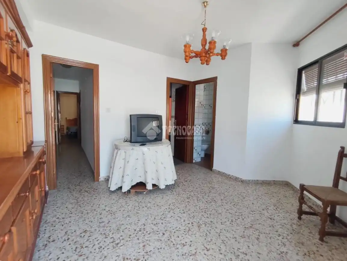Sala de estar de Casa adosada en venta en Guadix