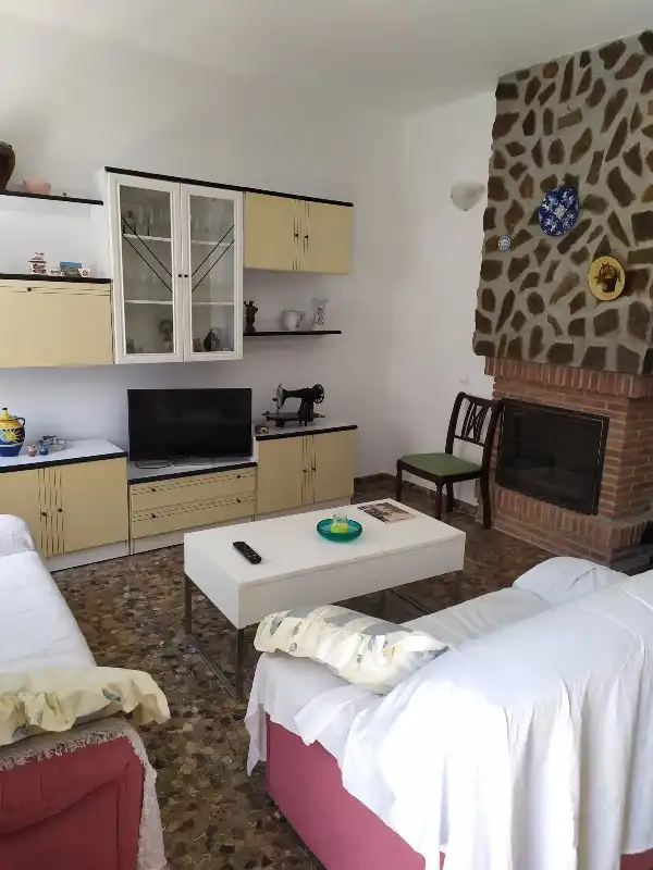 Sala de estar de Casa o chalet en venta en Nerja con Aire acondicionado, Calefacción y Terraza