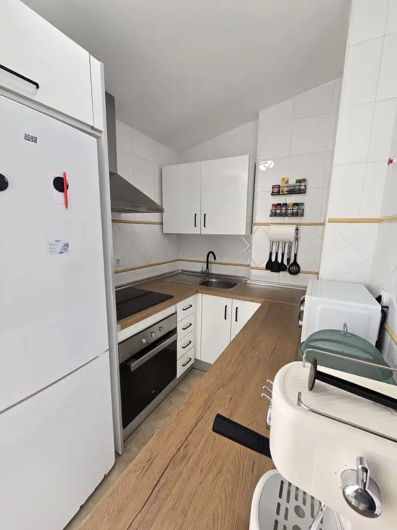 Kitchen of Attic for sale in Alcalá de Guadaira  with Air Conditioner, Terrace and Storage room