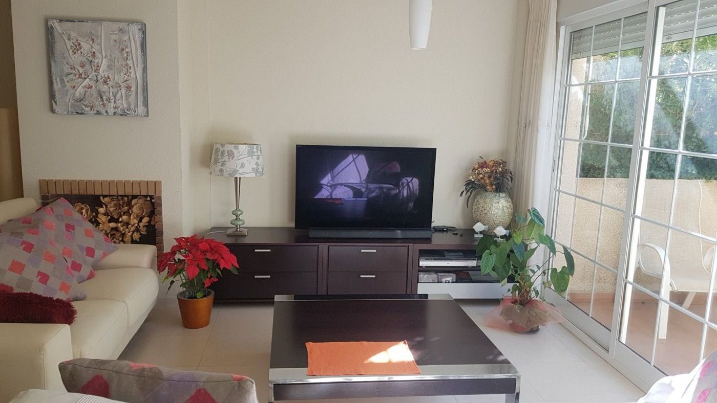Living room of Single-family semi-detached for sale in La Nucia  with Air Conditioner, Private garden and Community pool