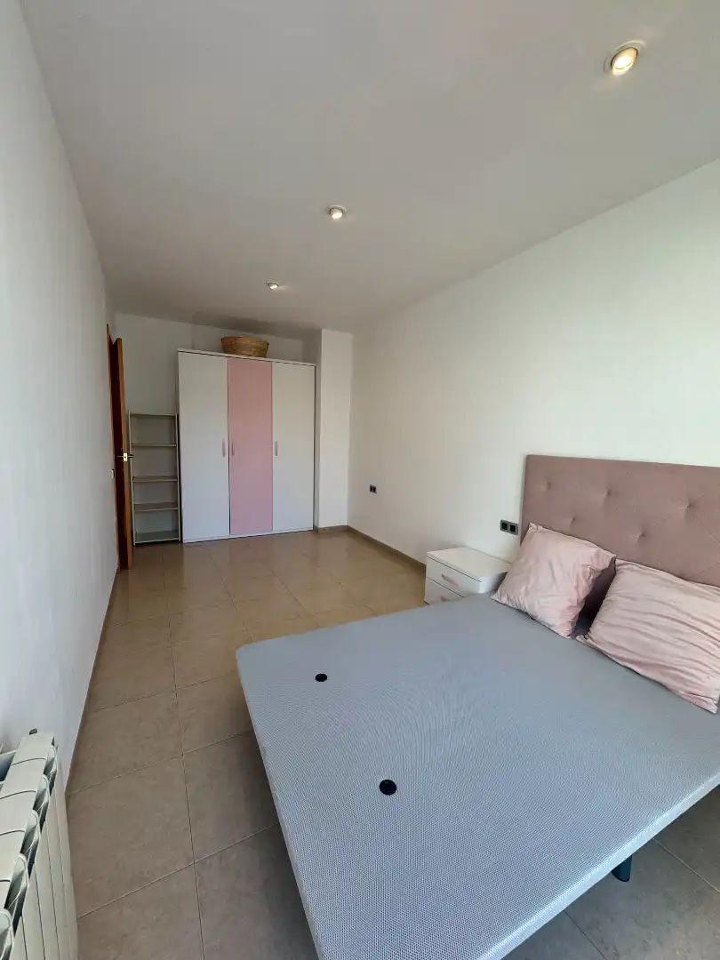 Dormitori de Dúplex de lloguer en Calella amb Aire condicionat, Calefacció i Terrassa