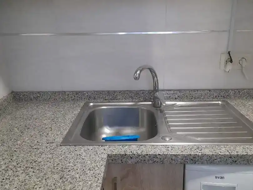 Cuina de Casa adosada de lloguer en Alcántara amb Aire condicionat i Moblat