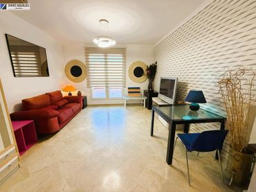 Apartament amb piscina de lloguer a Genil