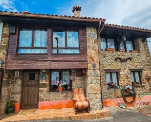 Exterior view of Single-family semi-detached for sale in Bimenes  with Private garden and Furnished