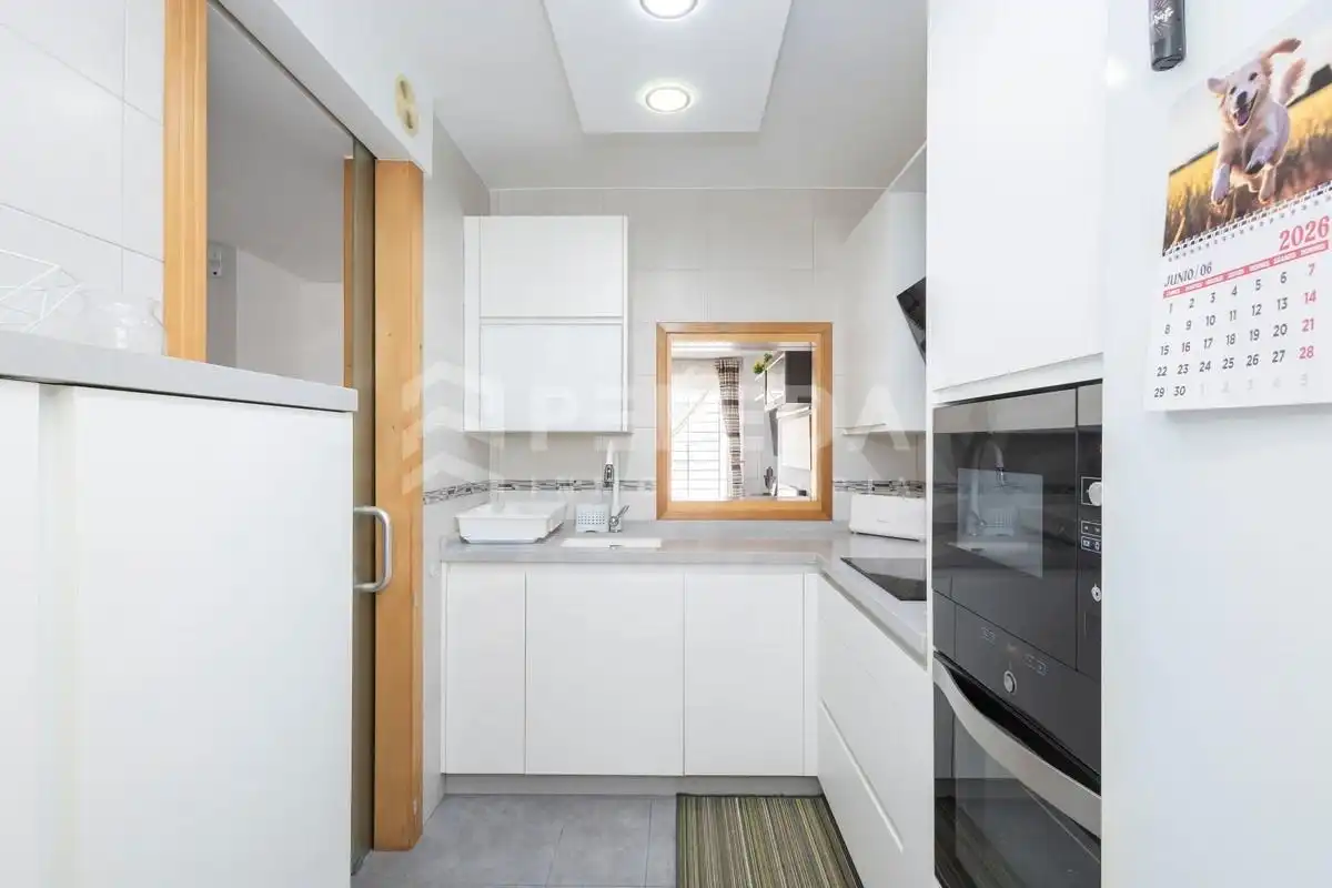 Kitchen of Ground floor for sale in Roquetas de Mar  with Air Conditioner, Private garden and Terrace