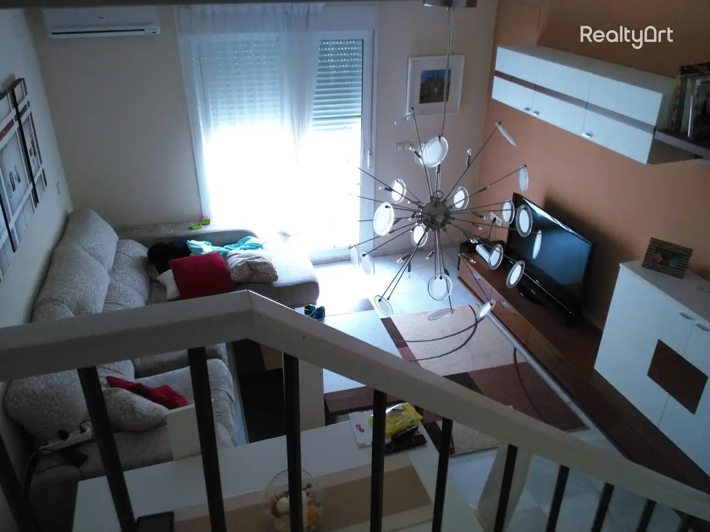 Sala de estar de Casa adosada en venta en Umbrete con Aire acondicionado, Calefacción y Jardín privado
