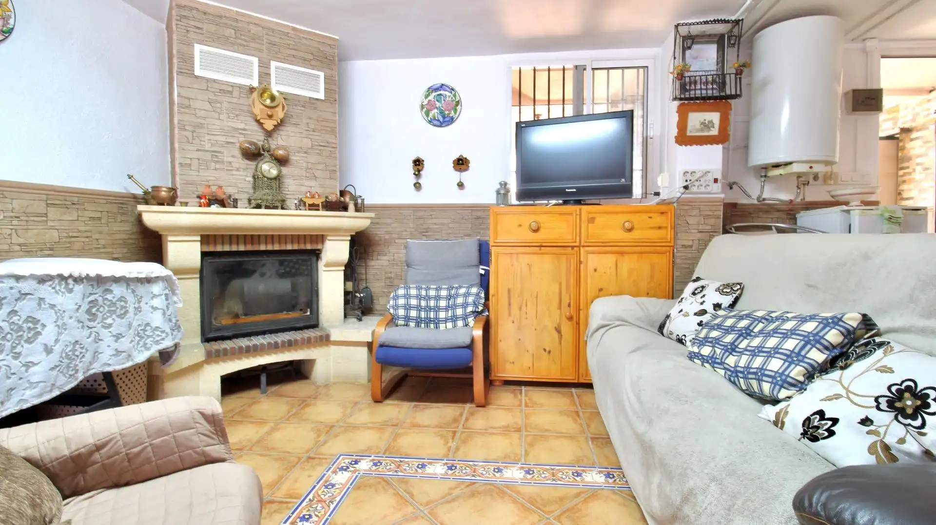 Sala de estar de Casa adosada en venta en Vegas del Genil con Aire acondicionado, Calefacción y Terraza