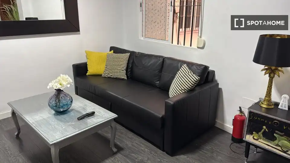 Sala de estar de Apartamento para compartir en Málaga con Aire acondicionado, Terraza y Amueblado